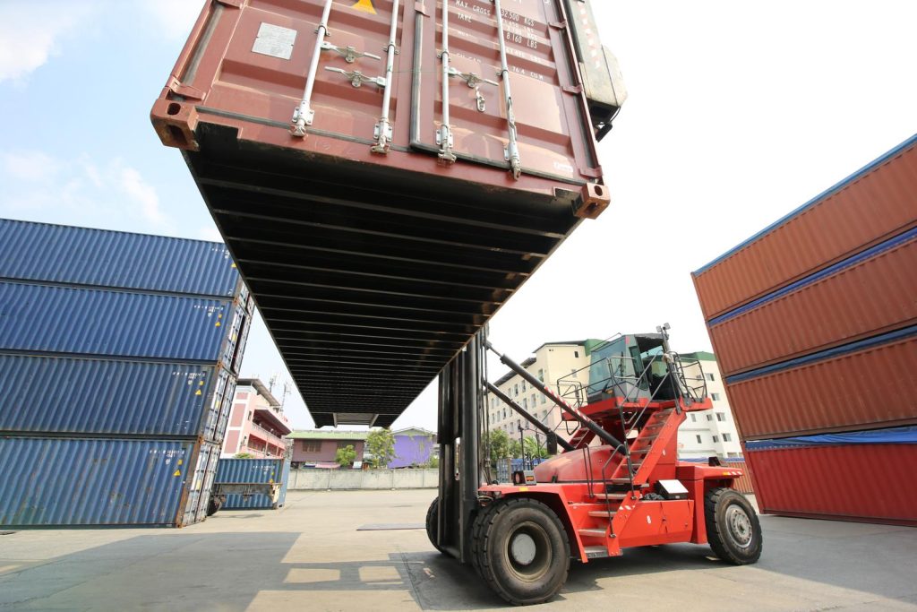 35584884-foreman-control-loading-containers-box-from-cargo-freight-ship-for-import-export-container-warehouse-worker